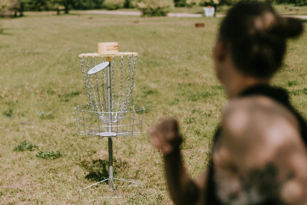 a person playing disc golf